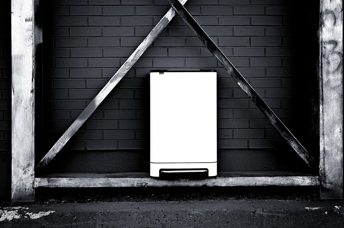 Designing an Industrial Apartment with Black and White Trash Cans